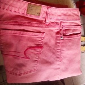 American Eagle Skinny Jeans Stretch Coral/Pink Pants.